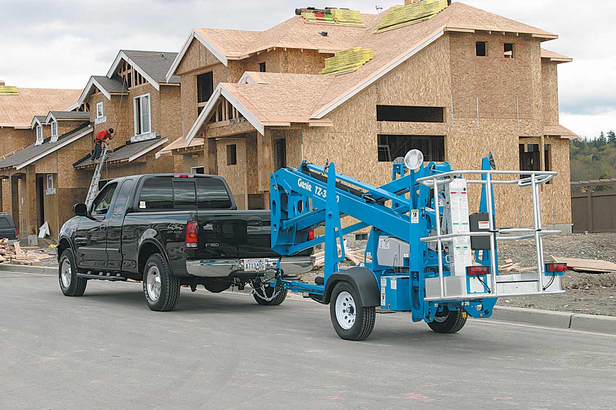 Genie TZ34/20, 34ft Electric Towable Knuckle Boom Lift — photo 6