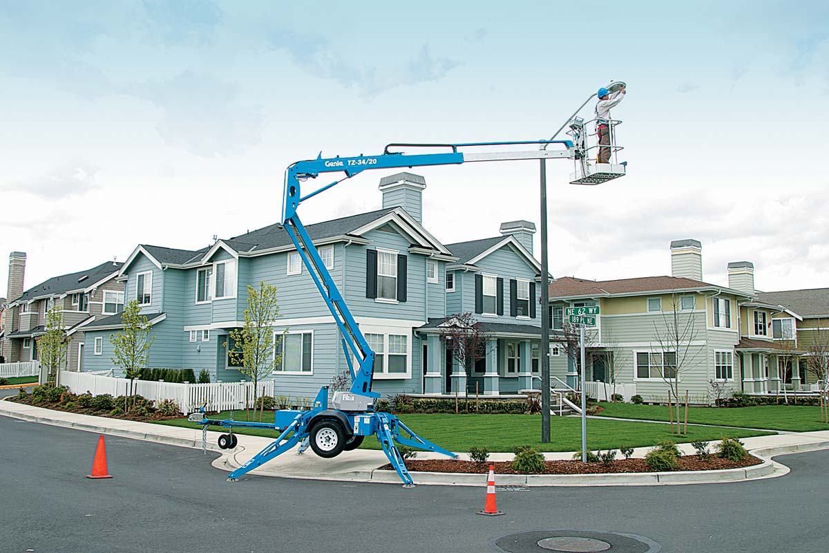 Genie TZ34/20, 34ft Electric Towable Knuckle Boom Lift — photo 1