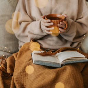 Individual taking intentional rest to regulate the nervous system during the holidays