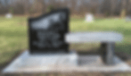 Image of couple etched on the headstone and an integrated bench.