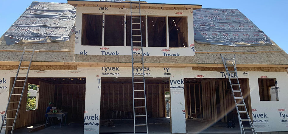 home being constructed with a garage