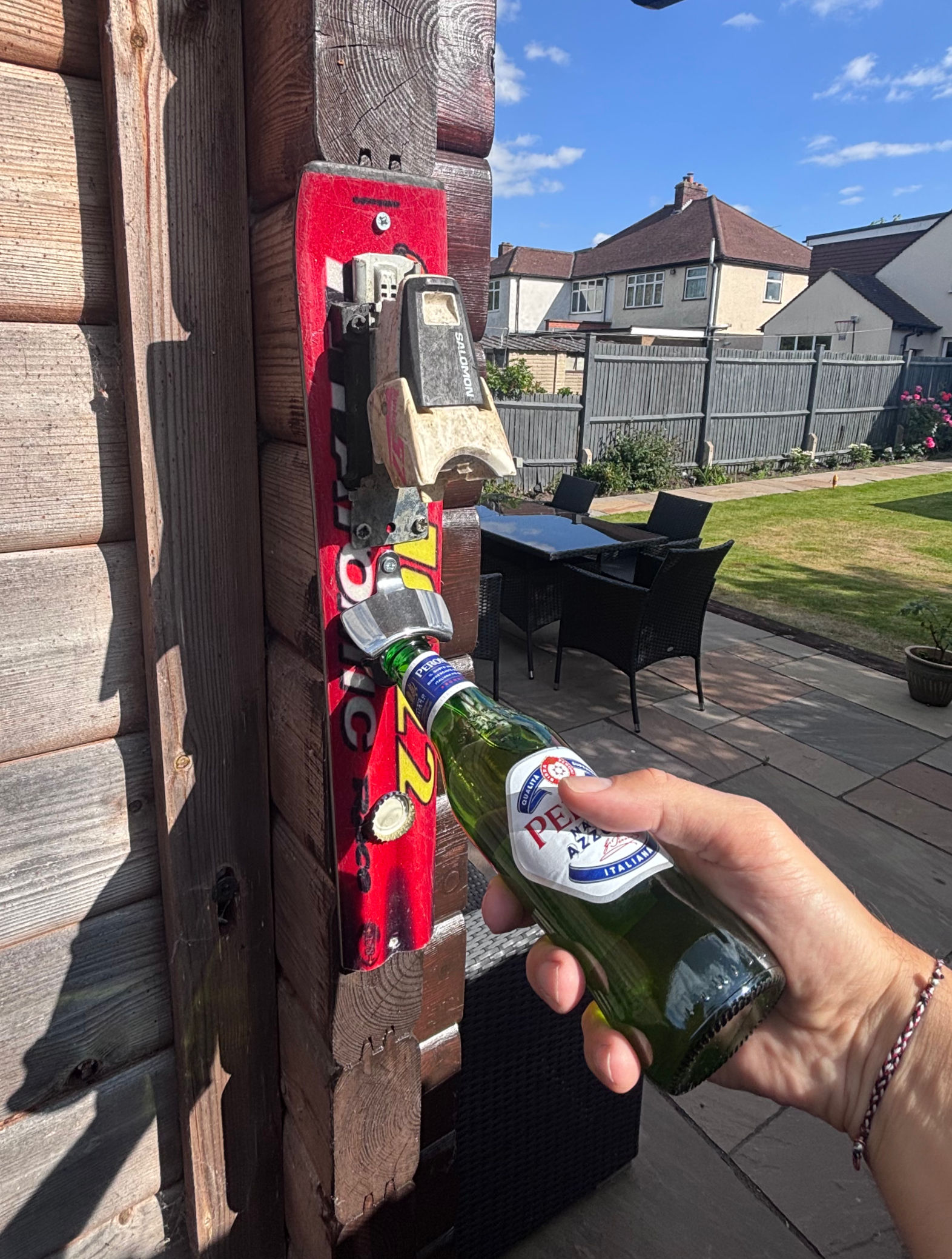 Wall mounted ski bottle opener (tail)