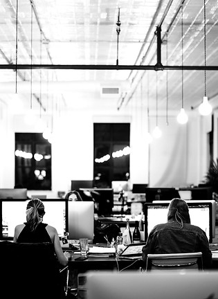 people sitting on chair in front of computer_edited.jpg