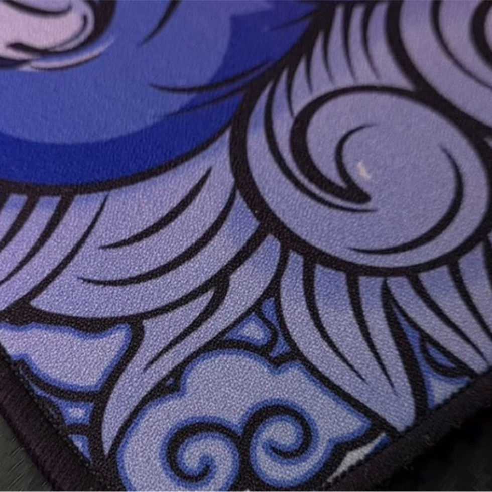 Thumbnail: Close up detailed view of a dark blue and purple anime gaming mouse pad texture
