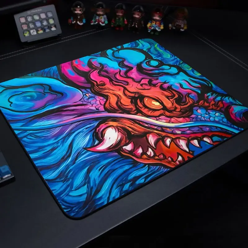 Thumbnail: Vibrant neon colored anime desk mat with a fierce dragon illustration for gamers