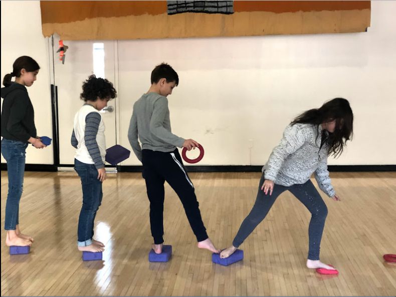From left to right: Elena Chirinos, Giacomo Cender, Cyrus Taber and Tate Collins, IXsK, playing “the Floor is Lava” in Rhythms