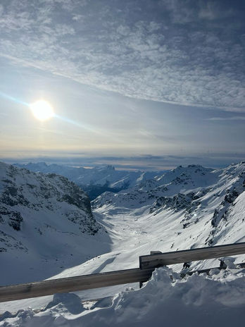 Sunrise in snowy ski mountains