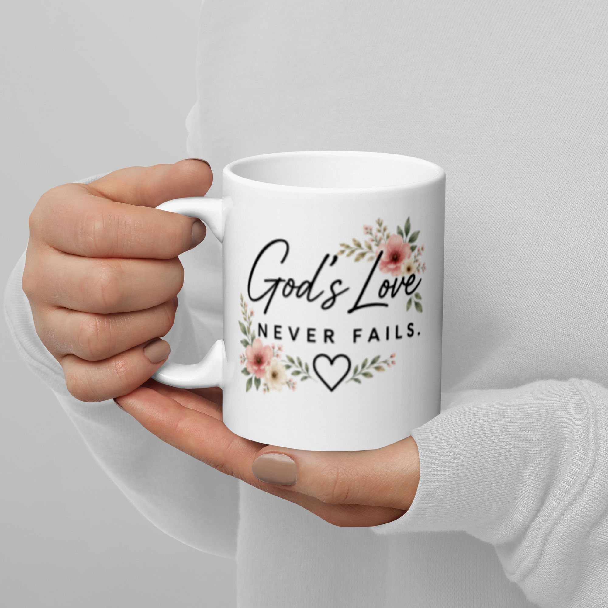 Christian Designs God's Love Never Fails 11oz White glossy ceramic mug