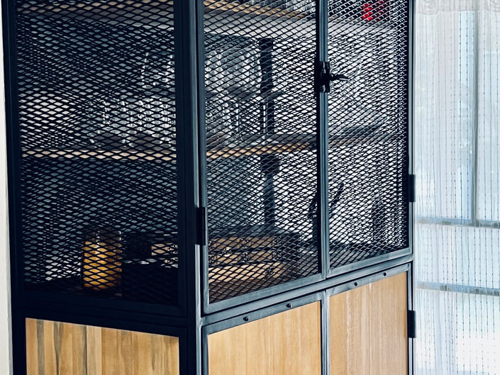 • Wood and metal cabinet