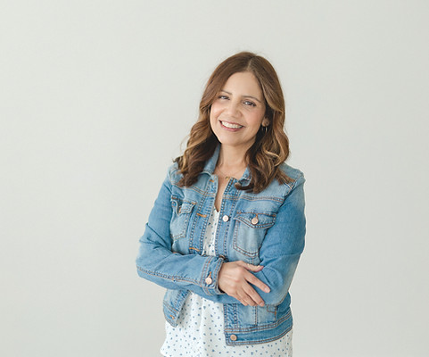 Yvonne Gonzalez, Licensed Educational Psychologist, smiling in a denim jacket with her arms crossed.