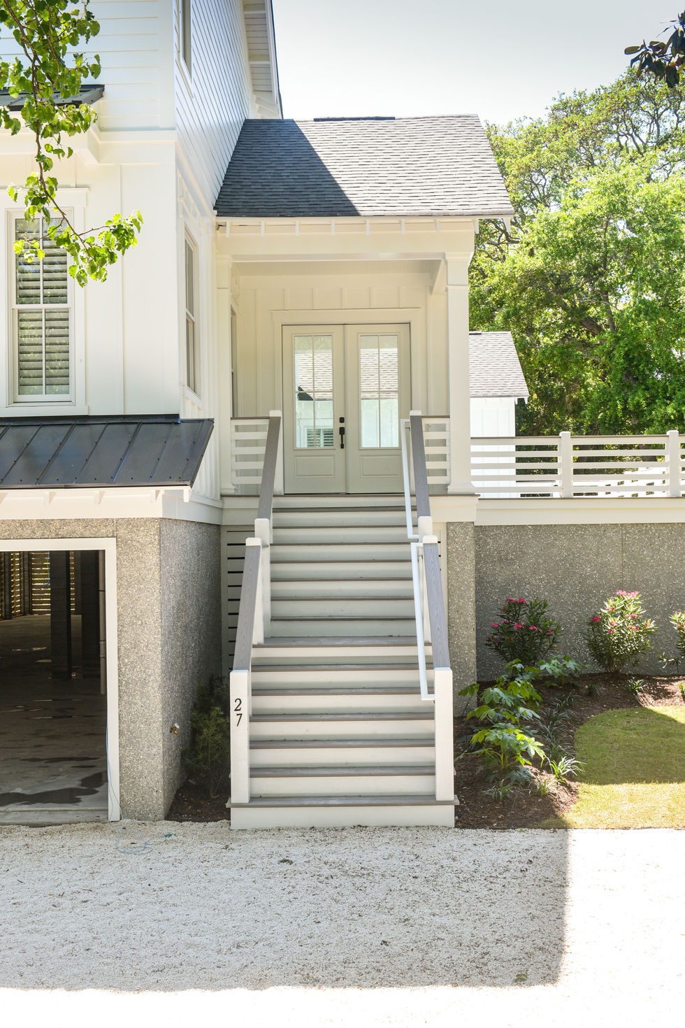 the number 27 is on the side of the house