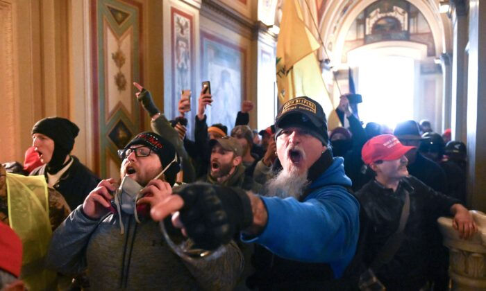 Supporters of Donald Trump protest inside the Capitol in Washington on Jan. 6, 2021. (Robe