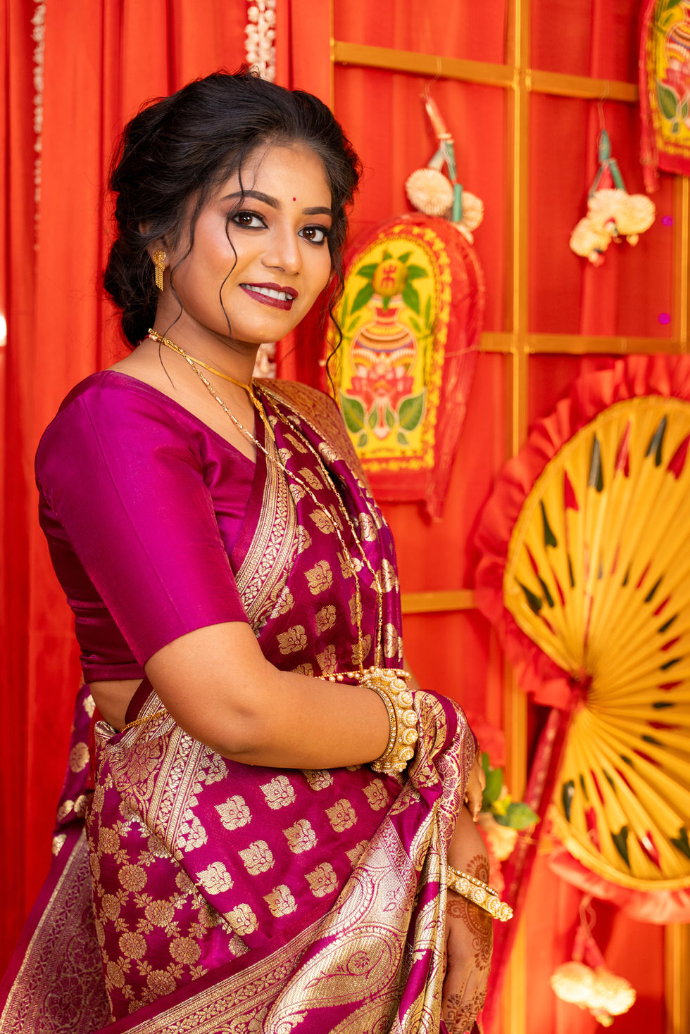 Smiling woman in traditional wedding saree