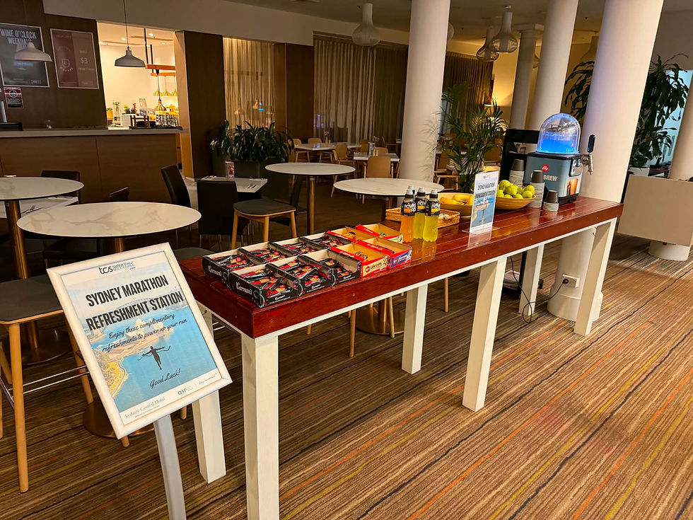 Sydney Marathon refreshment station at Sydney Central Hotel with drinks, fruit and snacks