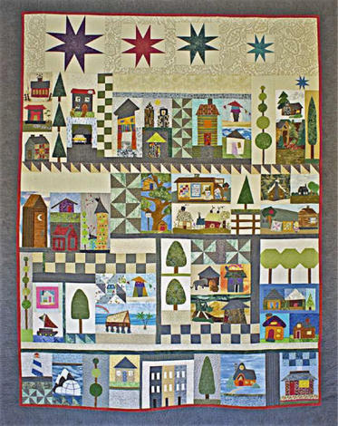 It Takes a Village quilt by the Clark County Quilters features quilt blocks that are of houses, trees and stars.  