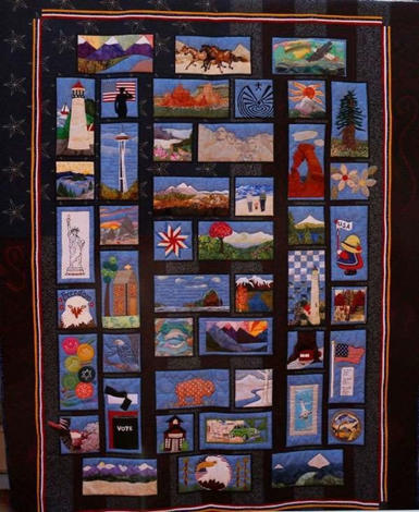 The Celebrate our Beautiful Land quilt features quilt blocks of landmarks from around the United States and was made by the Clark County Quilters to raise money for Students in Transition.