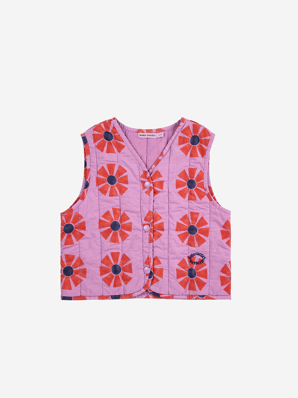Flat lay front view of the Kaleidoscope All Over Quilted Woven Vest in offwhite with red and blue circular pattern.
