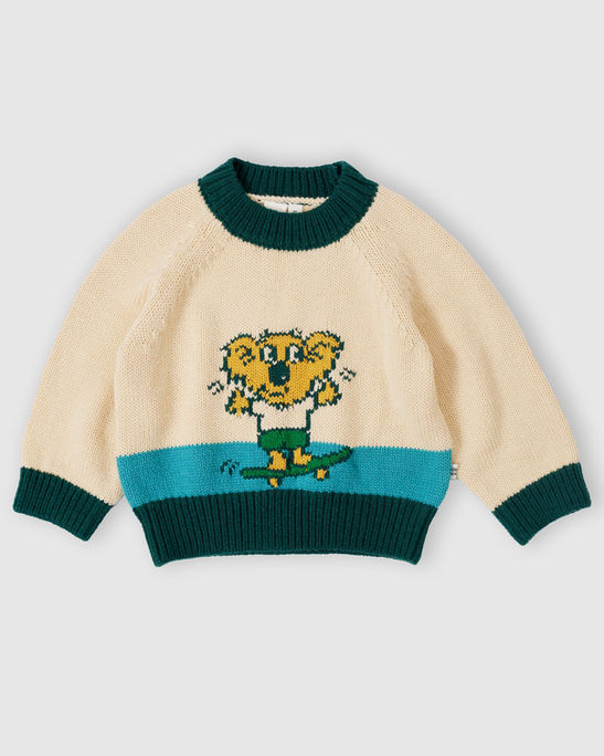 Front view of the Goldie & Ace Marley Koala Knit Jumper in cream and teal with a playful koala illustration on the chest.