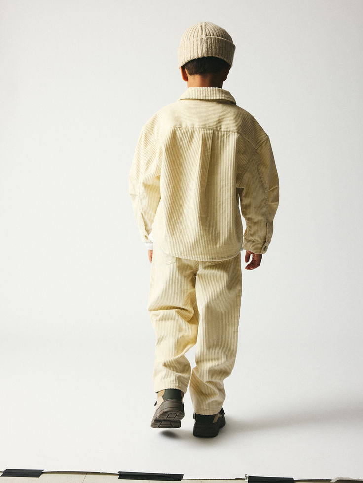 Back view of the Nohr Shirt showing its relaxed fit and curved hem.