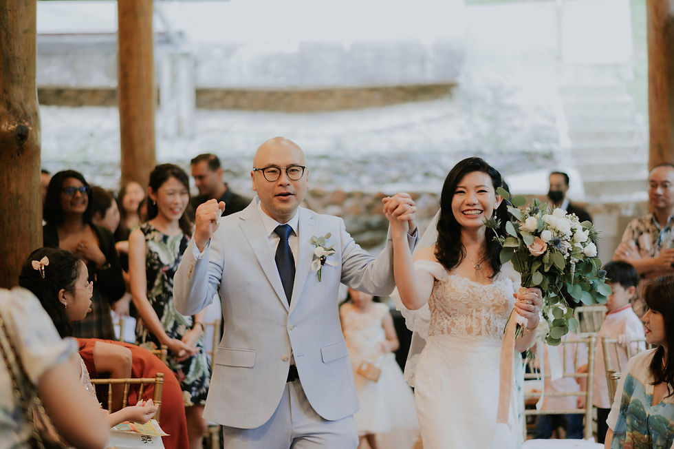 Bride and groom holding hands after their wedding ceremony