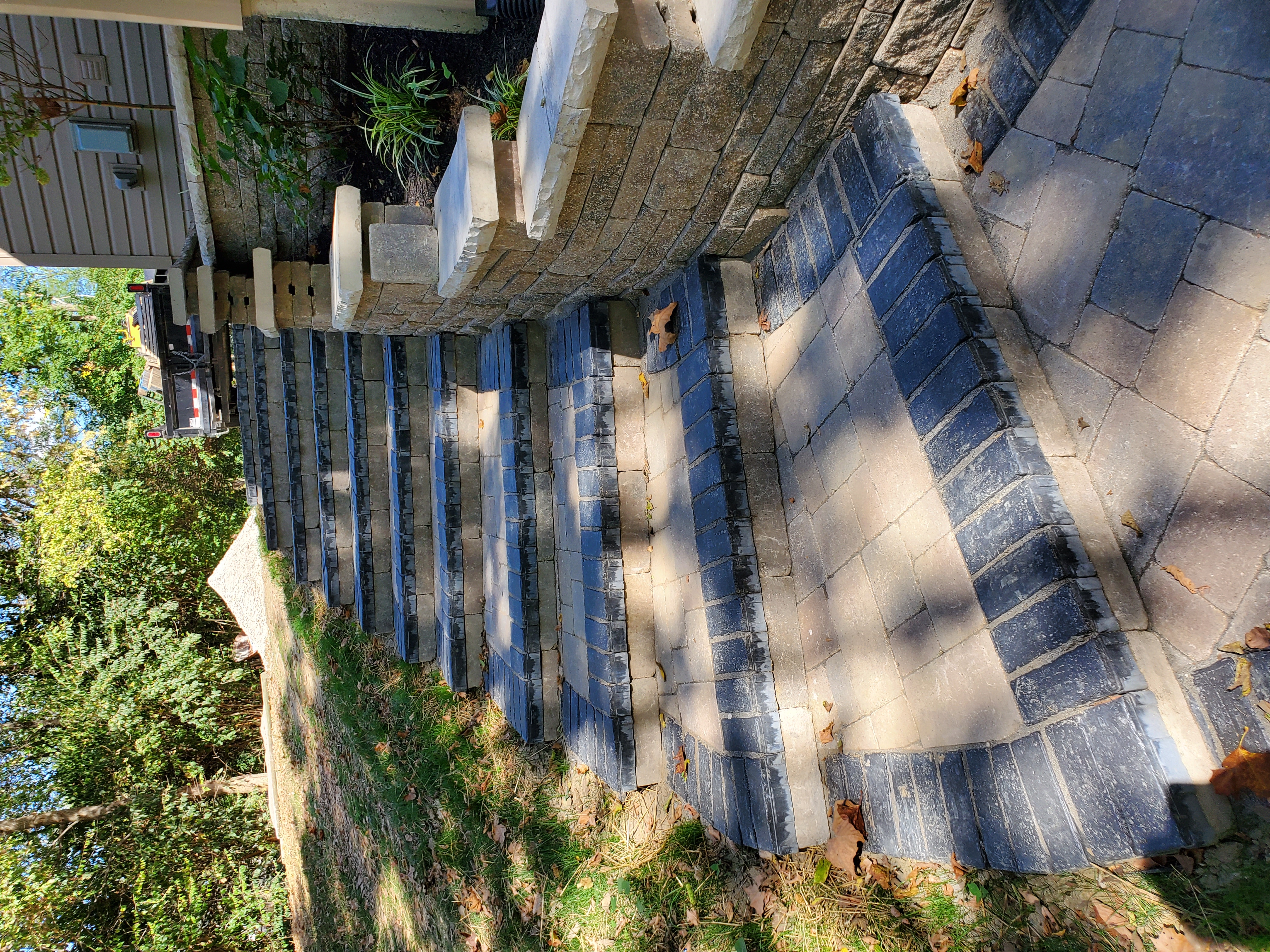 Paver stairway and retaining wall instal
