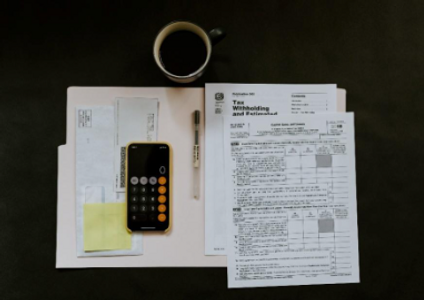 calculator on a desk, symbolizing financial planning and tax calculations
