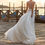 Thumbnail: Vintage Bohemian Chiffon Wedding Dress with Lace Detailing and a V-Neck