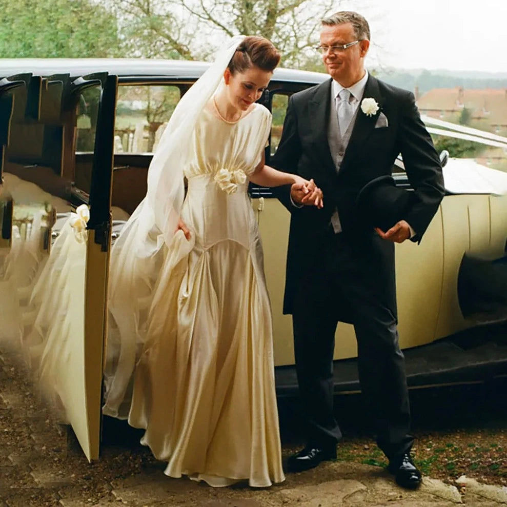 Elegant Silk Satin Wedding Dress with Cap Sleeves and Plunging Open Back - Vinta