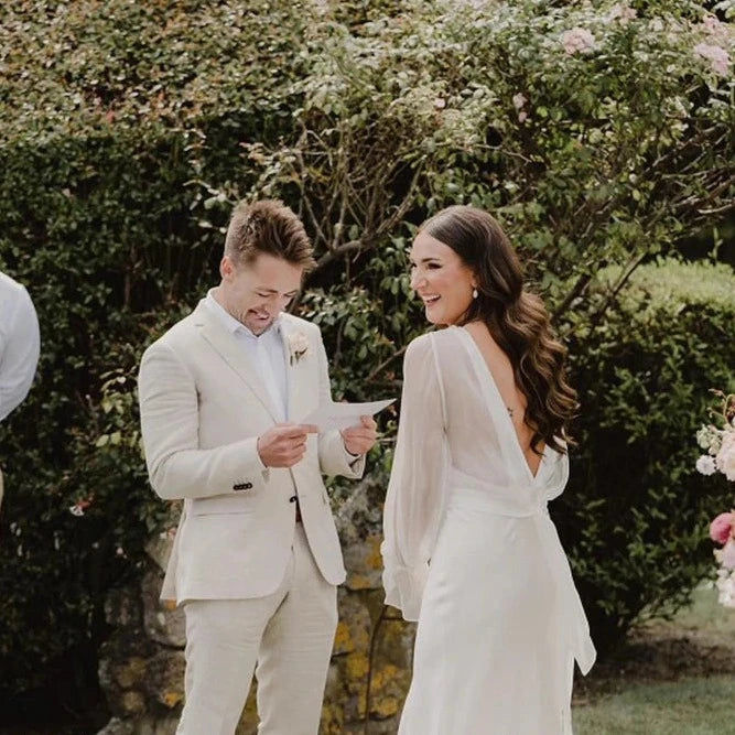 Thumbnail: Elegant O-Neck Tulle Mermaid Wedding Dress with Long Sleeves and Positive Slit