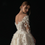 Thumbnail: Elegant A-Line Wedding Dress with Illusion Neckline, Embroidered Lace, and Court