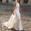 Thumbnail: Elegant Halter Neck Satin Wedding Dress with Backless Design and Sweep Train