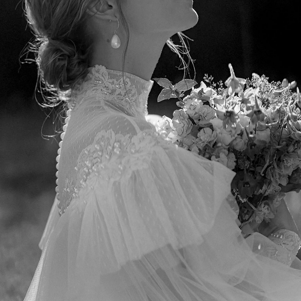 Thumbnail: Vintage Victorian Wedding Dress with High Neck, A-Line Silhouette, and Pearl Emb