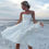 Thumbnail: Simple Strapless Tulle A-Line Knee-Length Wedding Dress with Sequins and Lace-Up