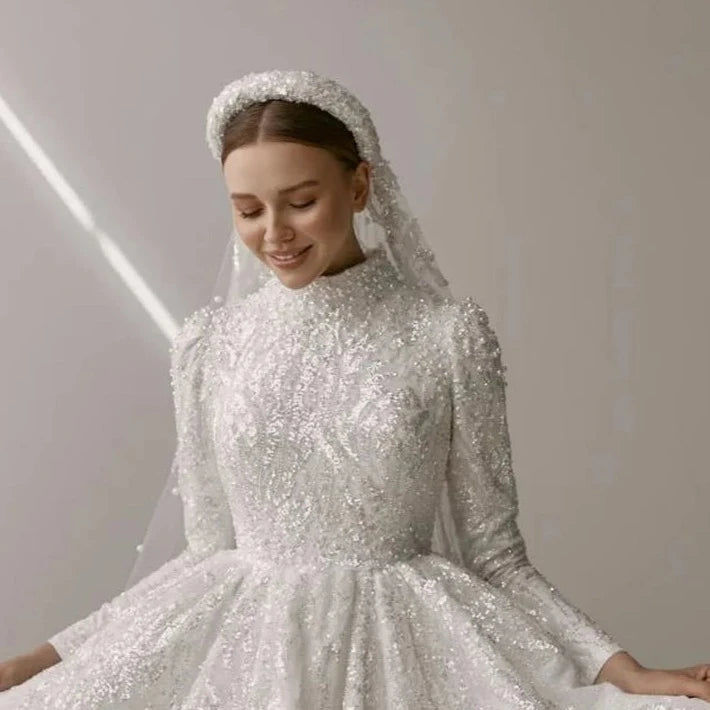 Thumbnail: Exquisite High-Neck Muslim Wedding Dress with Beading and Pearls, Modest Design 