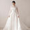 Thumbnail: Exquisite V-Neck Lace Wedding Dress with Full Sleeves and Sweep Train – Elegan