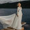 Thumbnail: Boho Lace V-Neck Wedding Dress with Full Sleeves and Sweep Train - Elegant Backl