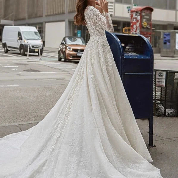 Thumbnail: Classic Vintage Italian Lace A-Line Wedding Dress with Illusion Long Sleeves and