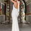 Thumbnail: Elegant Boho Halter Wedding Dress with Sweep Train and Backless Design