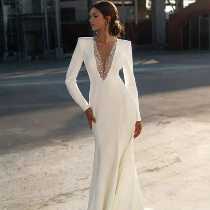Thumbnail: Elegant Mermaid Wedding Dress with Long Sleeves, Beaded V-Neck, and Sweep Train