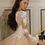 Thumbnail: Modern Vintage Italian A-Line Wedding Dress with Crystal Beading and Chapel Trai