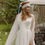 Thumbnail: Elegant A-Line V-Neck Long Sleeve Wedding Dress with Tulle Sweep Train