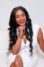 Professional studio headshot of Natalie Wisdom, LCSW, a BIPOC therapist and life coach for New York and Connecticut.