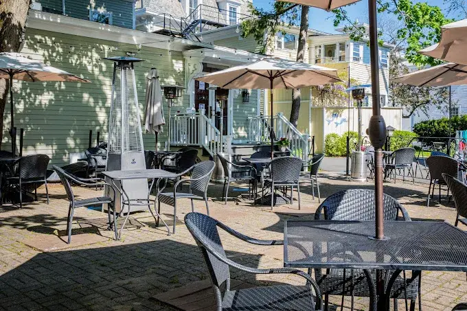 A view of the bright outside seating area at Chapter One Food and Drink Guilford