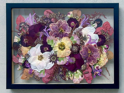 amazing preserved wedding bouquet with purple and light coloured flowers