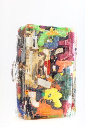 Suitcase plastic guns