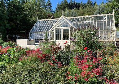 greenhouse front with flowers waterfall.jpeg