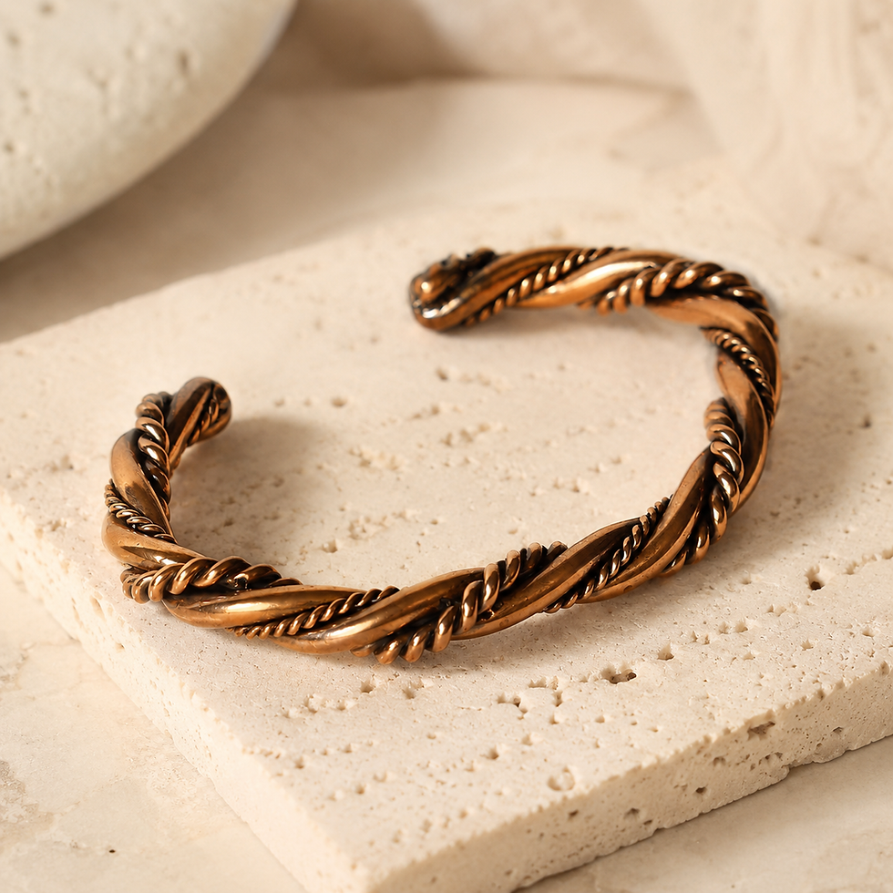 Thumbnail: Twisted copper cuff bracelet with braided rope detail, polished finish, darkened grooves, and open adjustable design.