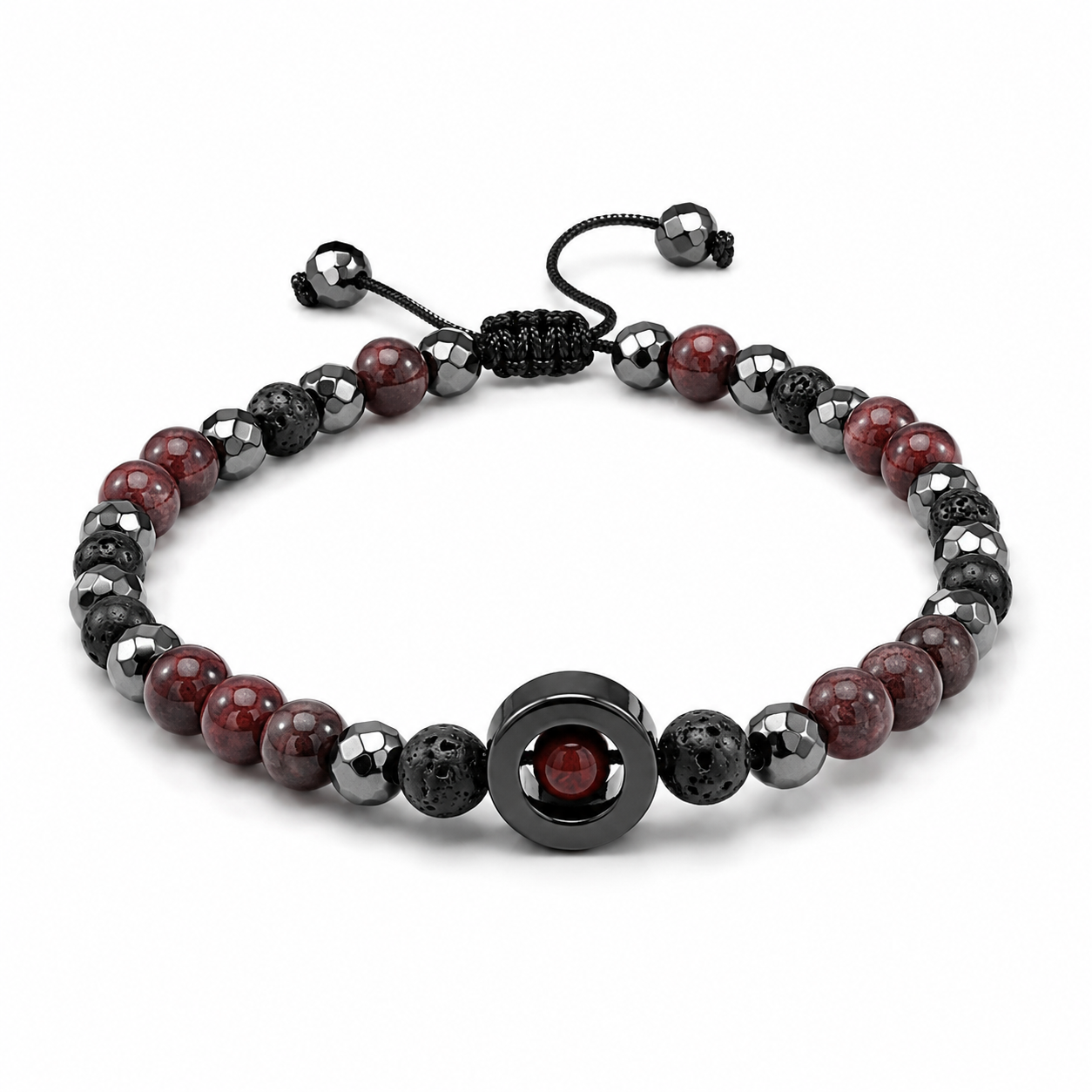 Garnet, lava, and hematite stackable bracelet with red stone beads, black lava beads, faceted hematite, and adjustable cord.