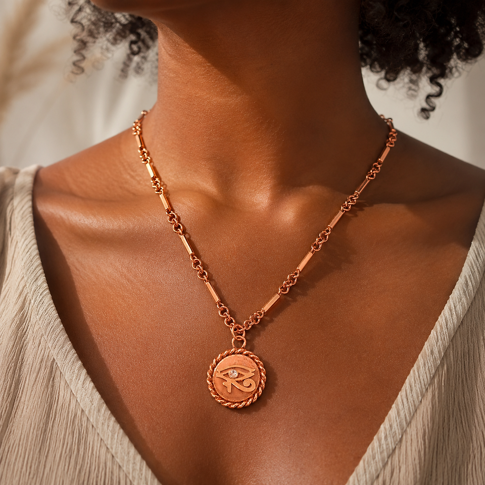 Handcrafted copper tensor ring necklace with Eye of Horus pendant, gold-tone detail, clear crystal accent, and copper chain.