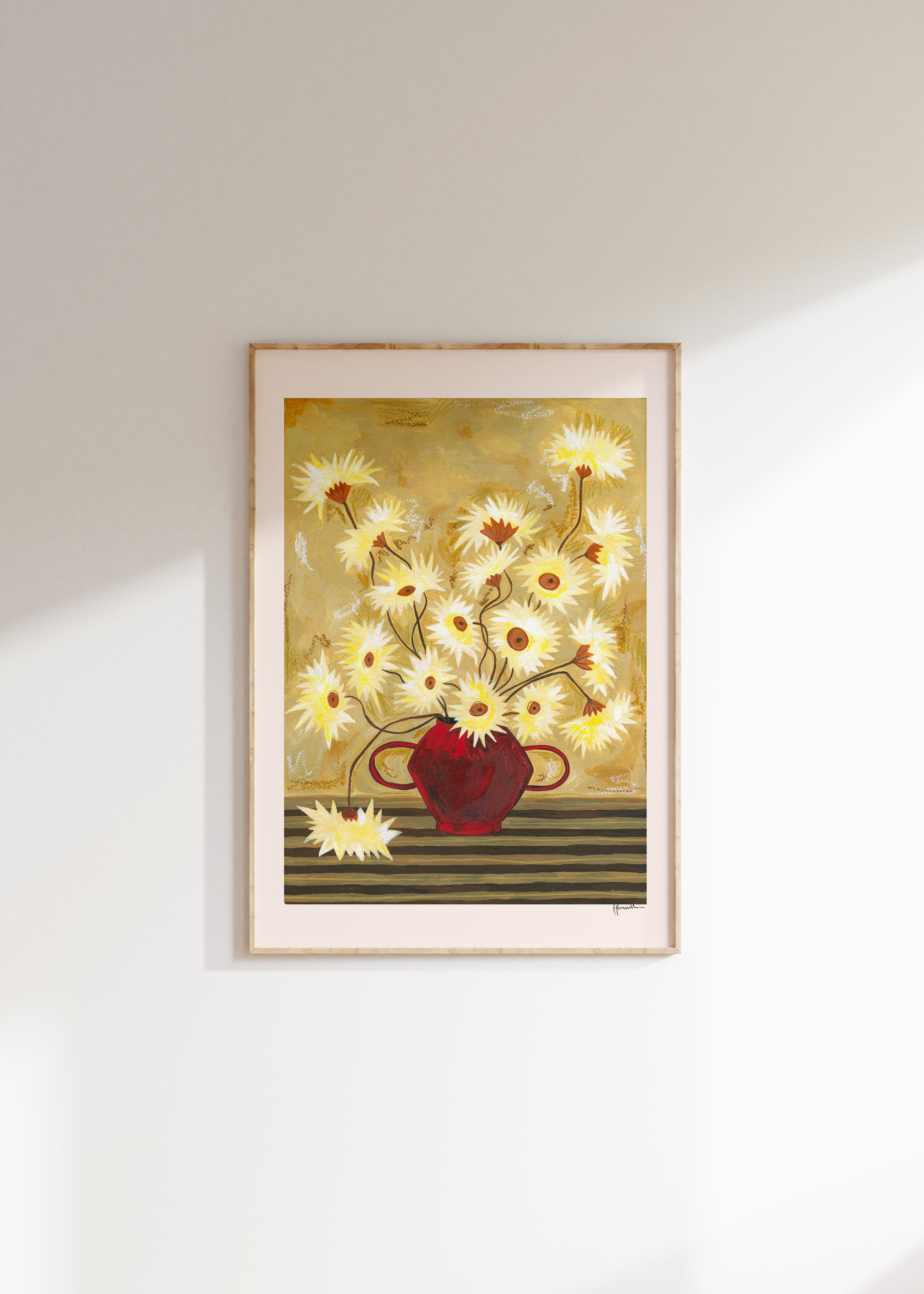 spiky gerberas in red vase